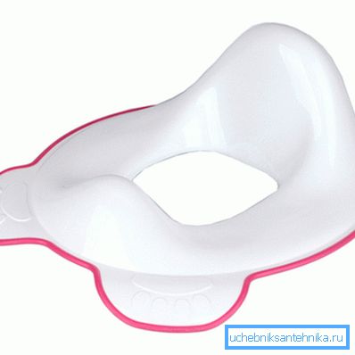 Foto av anatomisk toalettsete for et barn Foto av anatomisk toalettsete for et barn