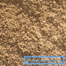 Det lagt rør er dekket med sand. Det lagt rør er dekket med sand.